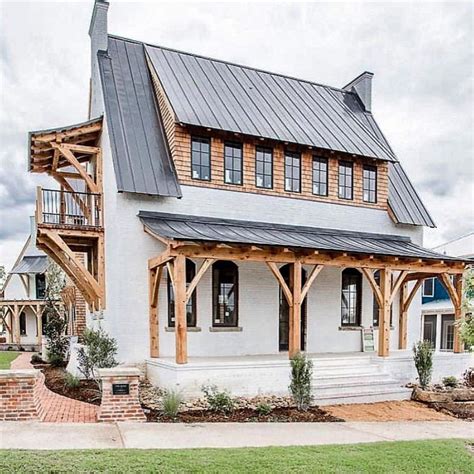 black metal roof white brick house|black brick house exterior.